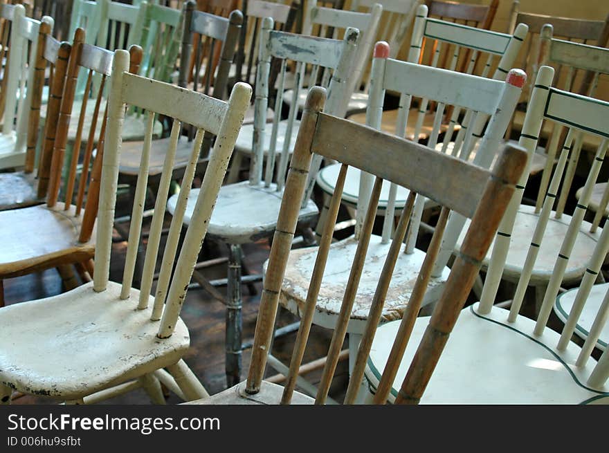 Rows of antique chairs.