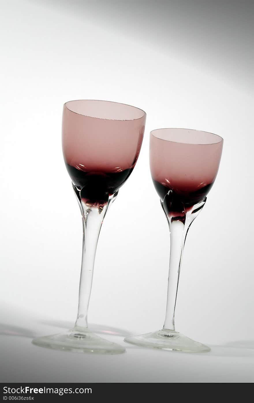 Red glasses for wine with spot light. Red glasses for wine with spot light