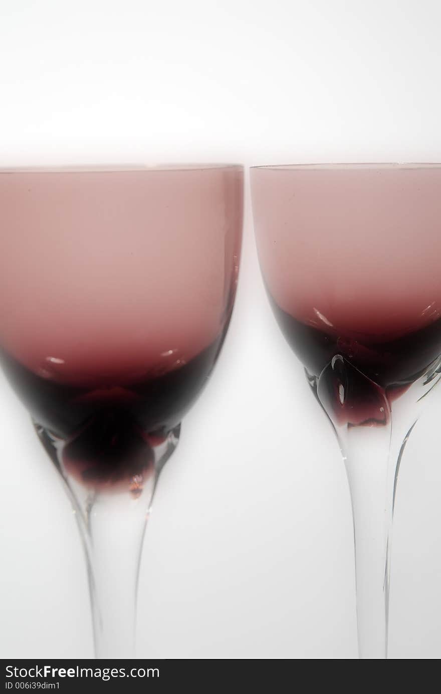 Red glasses for wine with spot light and soft filter. Red glasses for wine with spot light and soft filter