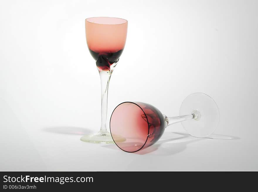 Red glasses for wine with spot light and soft filter. Red glasses for wine with spot light and soft filter