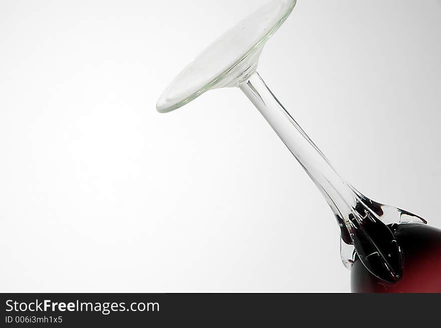 Detail of red glass for wine with spot light. Detail of red glass for wine with spot light