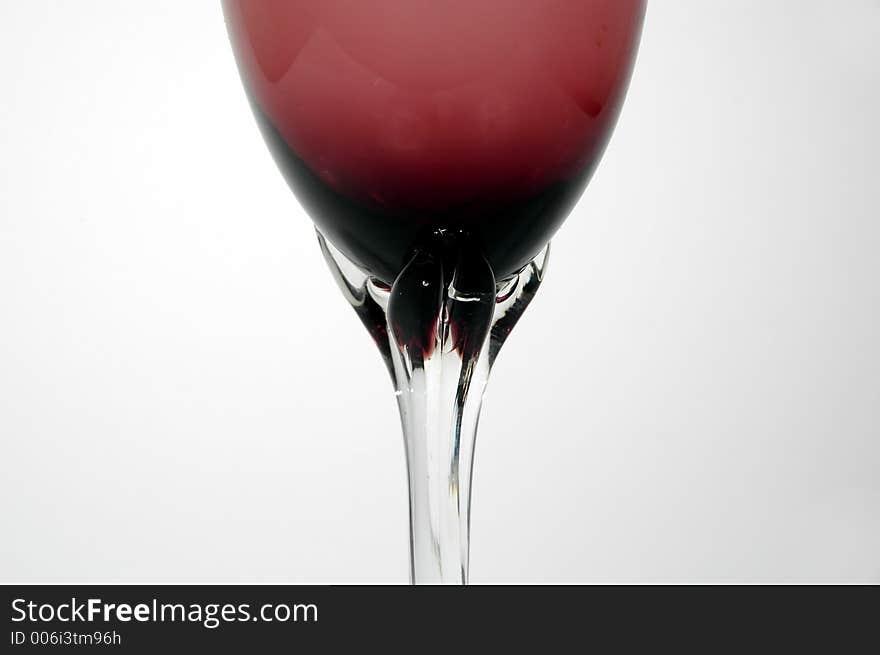 Detail of red glass for wine with spot light. Detail of red glass for wine with spot light