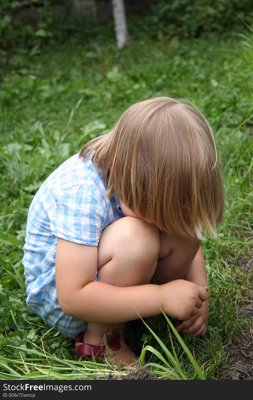 A girl with green plants. A girl with green plants