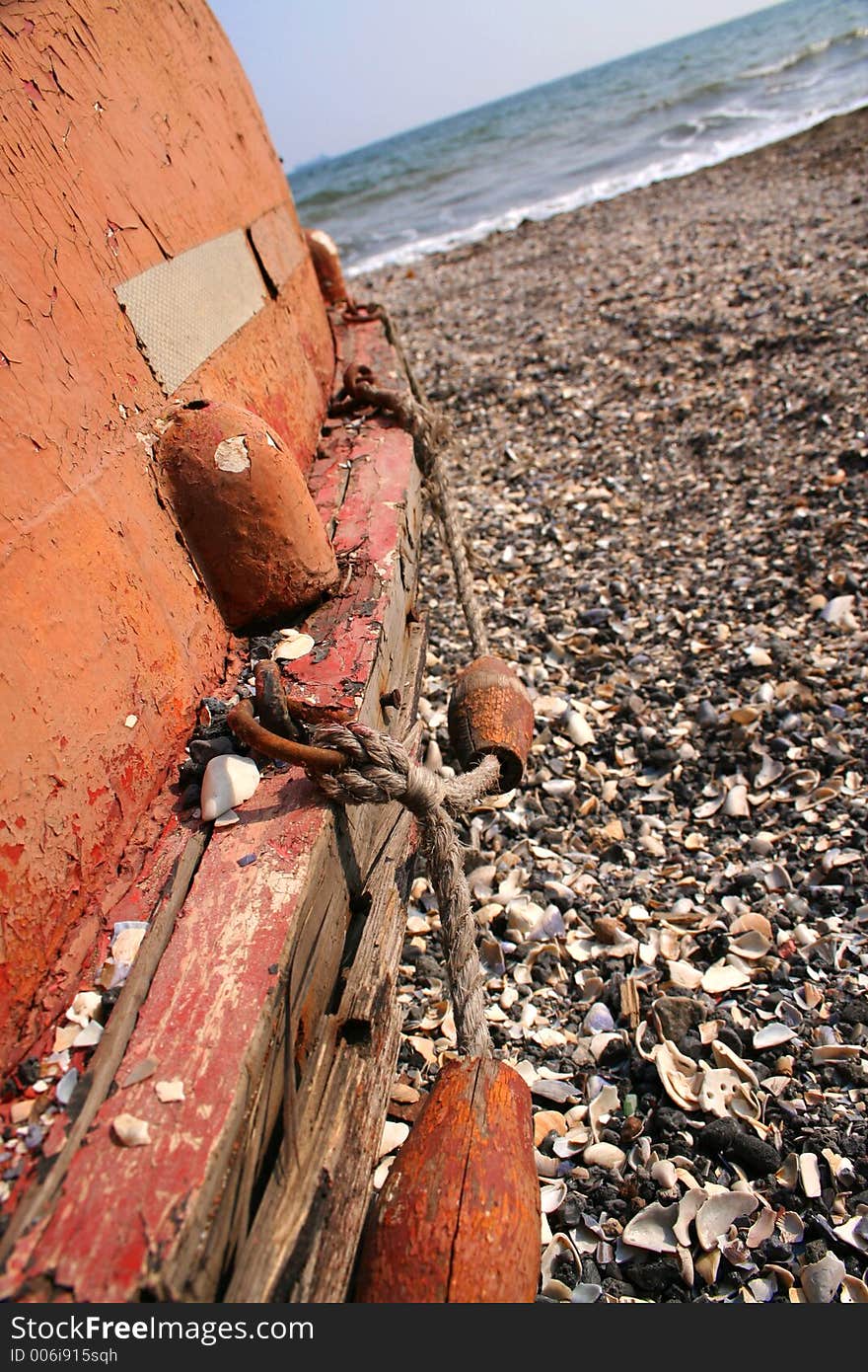 Old boat of the fisherman on a coast