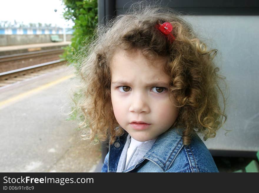 Little girl's expression: anger for the long waiting