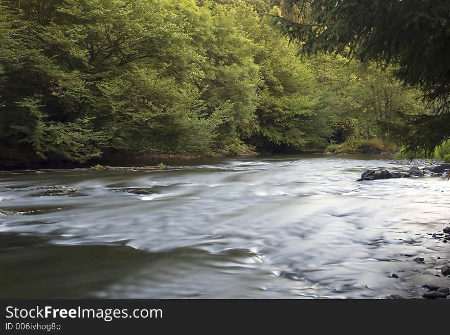 Flowing river ourthe in belgium