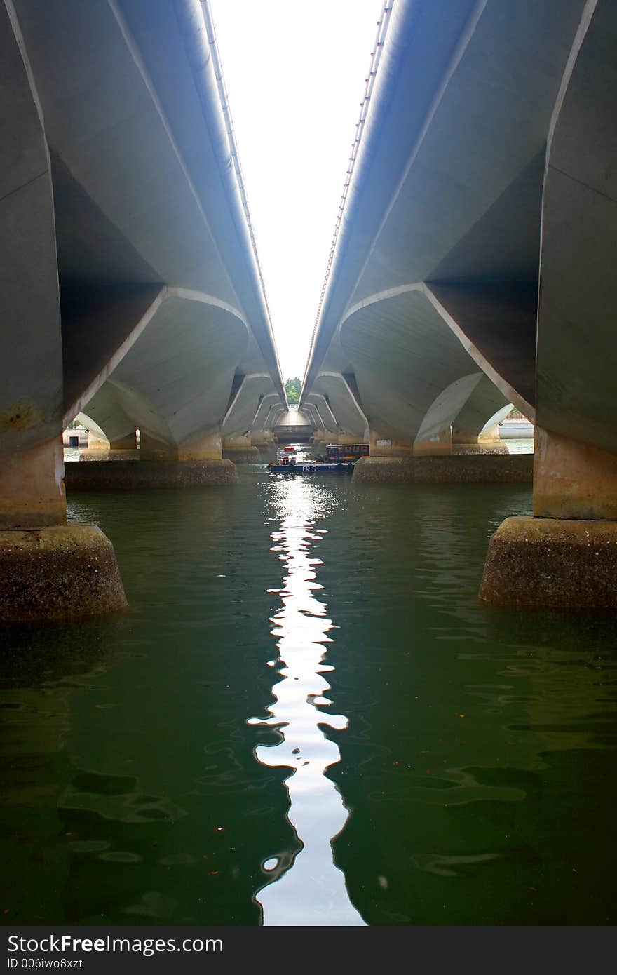 Boat under bridge in singapour