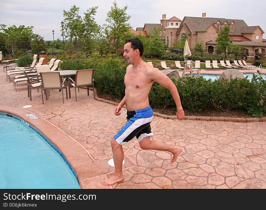 Man jumping into pool. Man jumping into pool