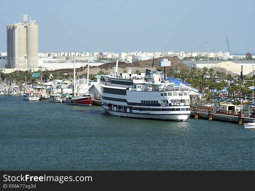 Florida port with fishing boats and cruise ship. Florida port with fishing boats and cruise ship