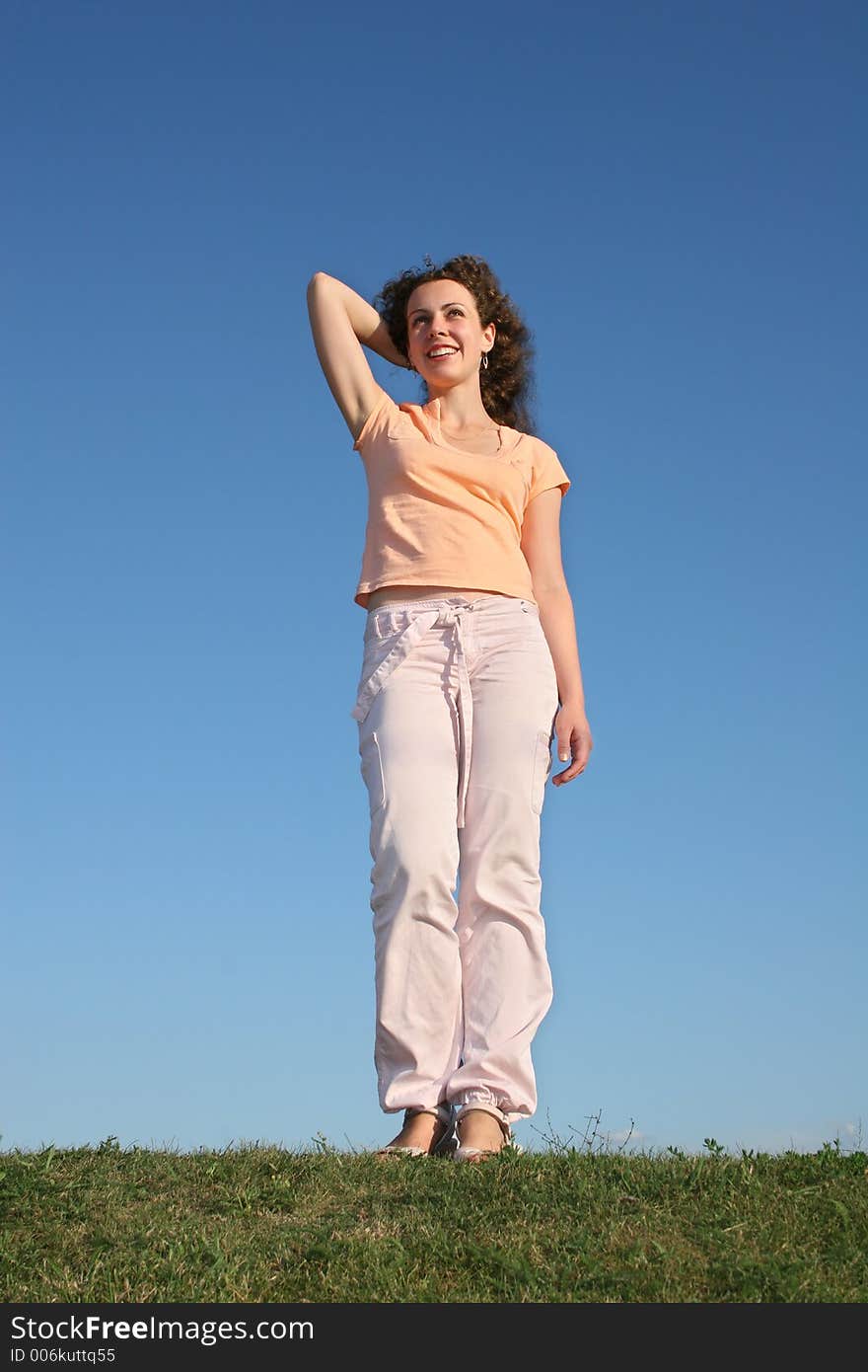 Smile girl stand on grass