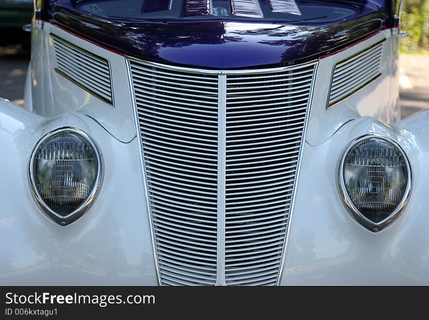 Retro car – front view. Retro car – front view