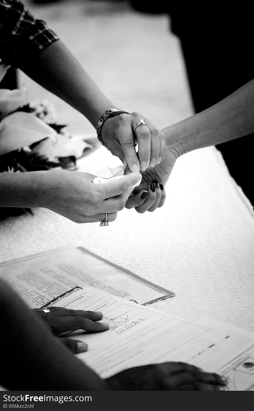 Finger printing at a Mexican wedding