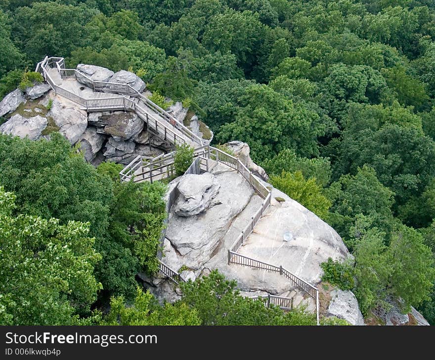 Hiking trail with stairs on rock in mountains of nc