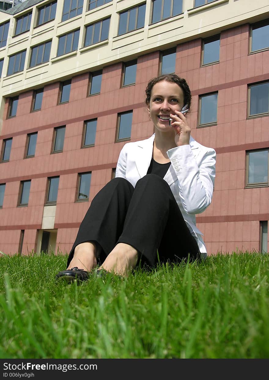 BUSINESSWOMAN AND PHONE