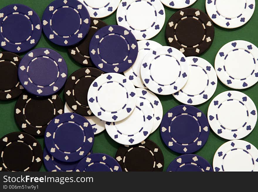 Casino Chips, Black, Blue, White on Green Background