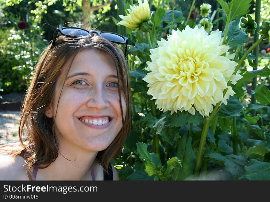 Attractive Woman next to Flower