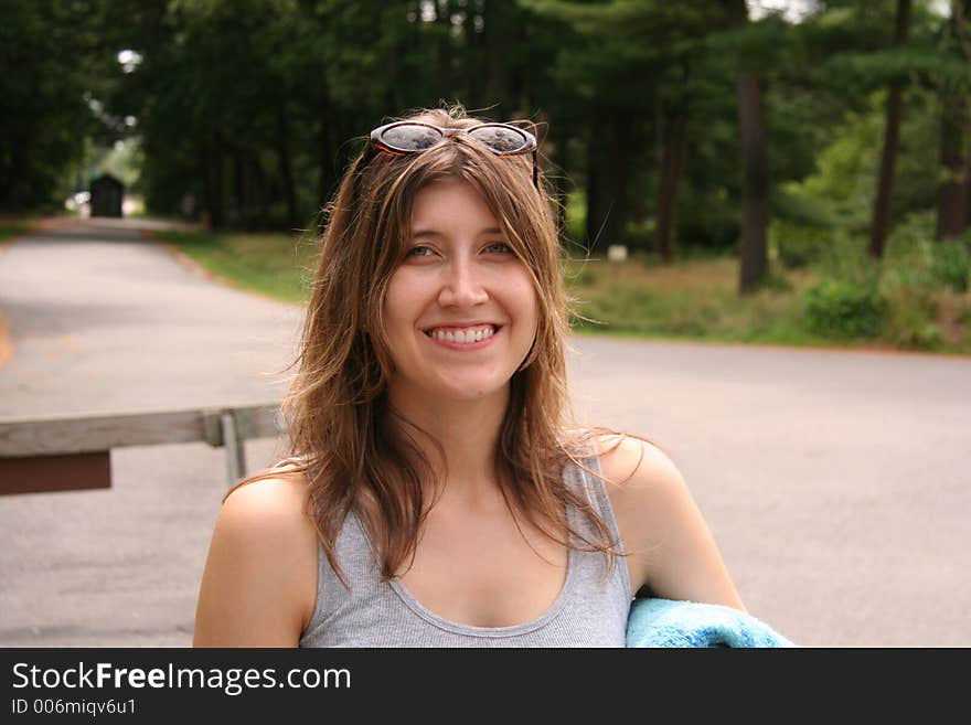 Cute Girl in Park holding blanket