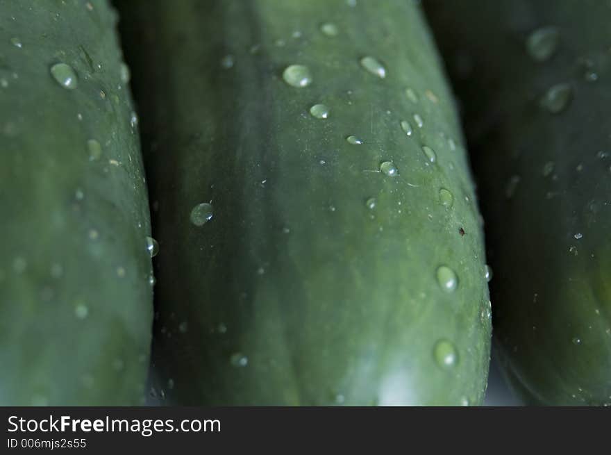 Wet cucumbers closeup.