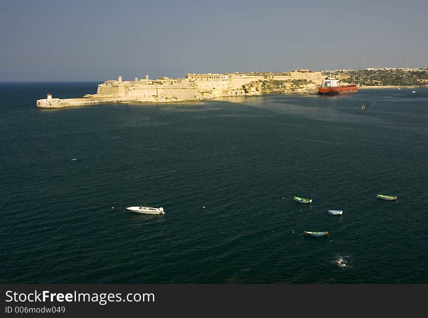 Malta. Old fort view + Ship & boats.