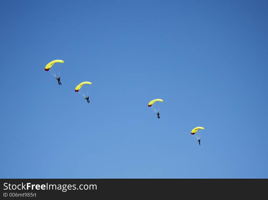 Skydivers participating in an international team competition. Skydivers participating in an international team competition.