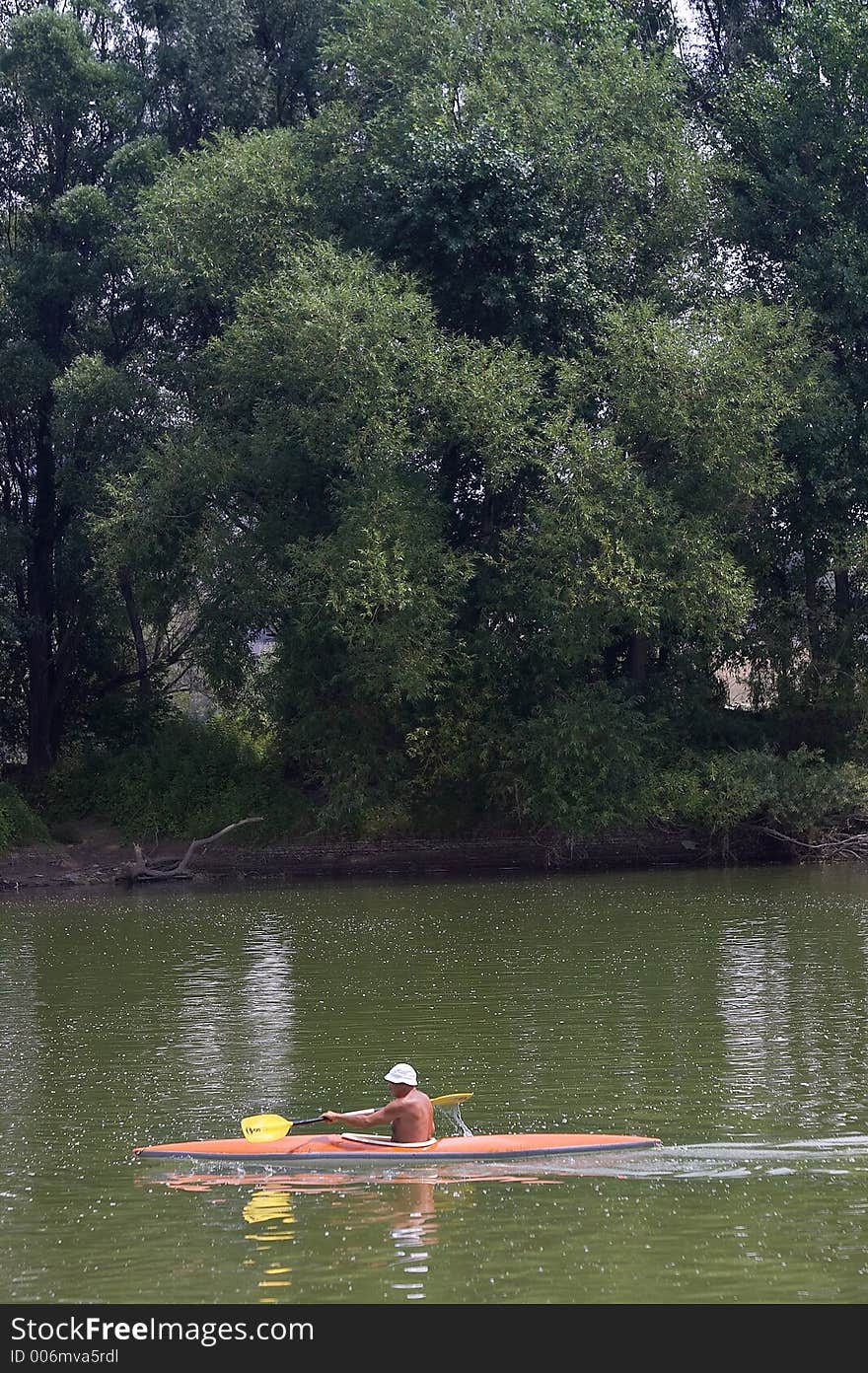 Man in a boat on a lake. Man in a boat on a lake