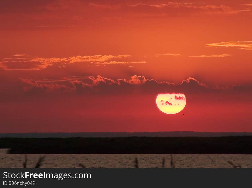 Sea, beautiful sunset with clouds