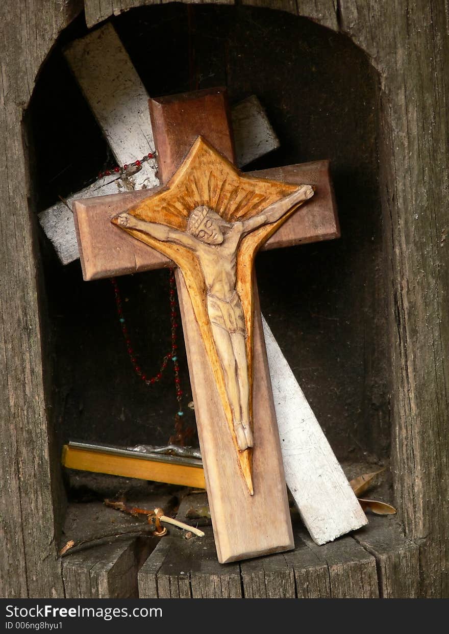 Figure of Jesus on a wooden cross. Figure of Jesus on a wooden cross