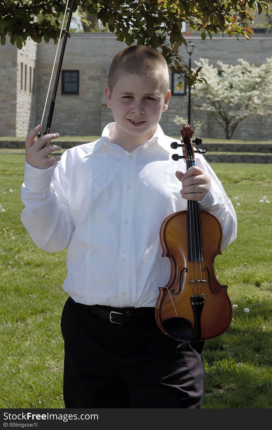 Boy Standing Outside With Viola