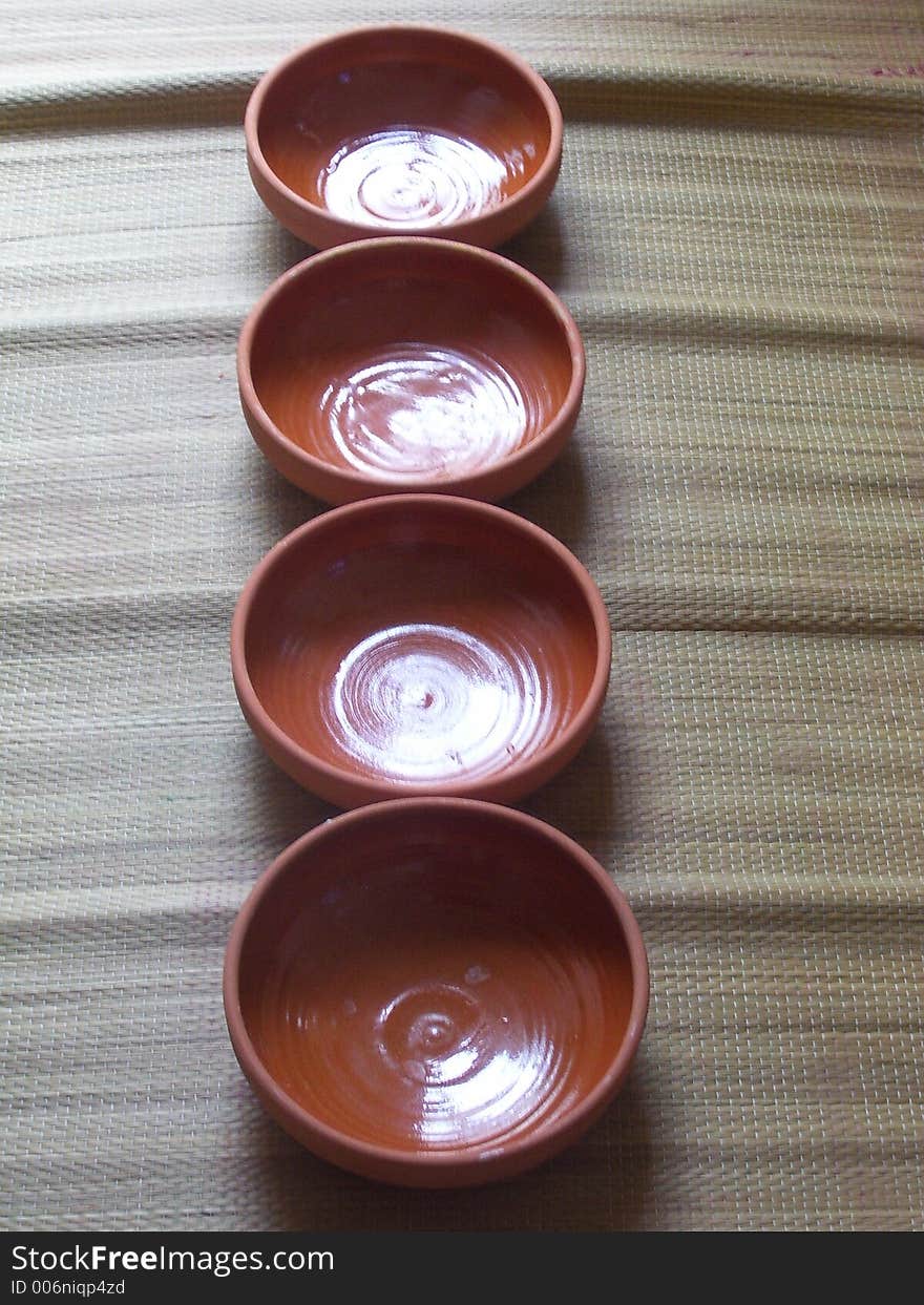 Clay plates in line