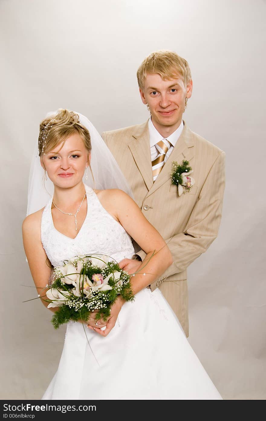 Portrait newlyweds in studio. Portrait newlyweds in studio