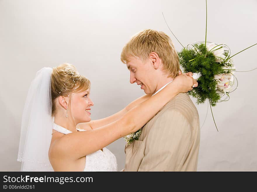 Portrait newlyweds in studio. Portrait newlyweds in studio