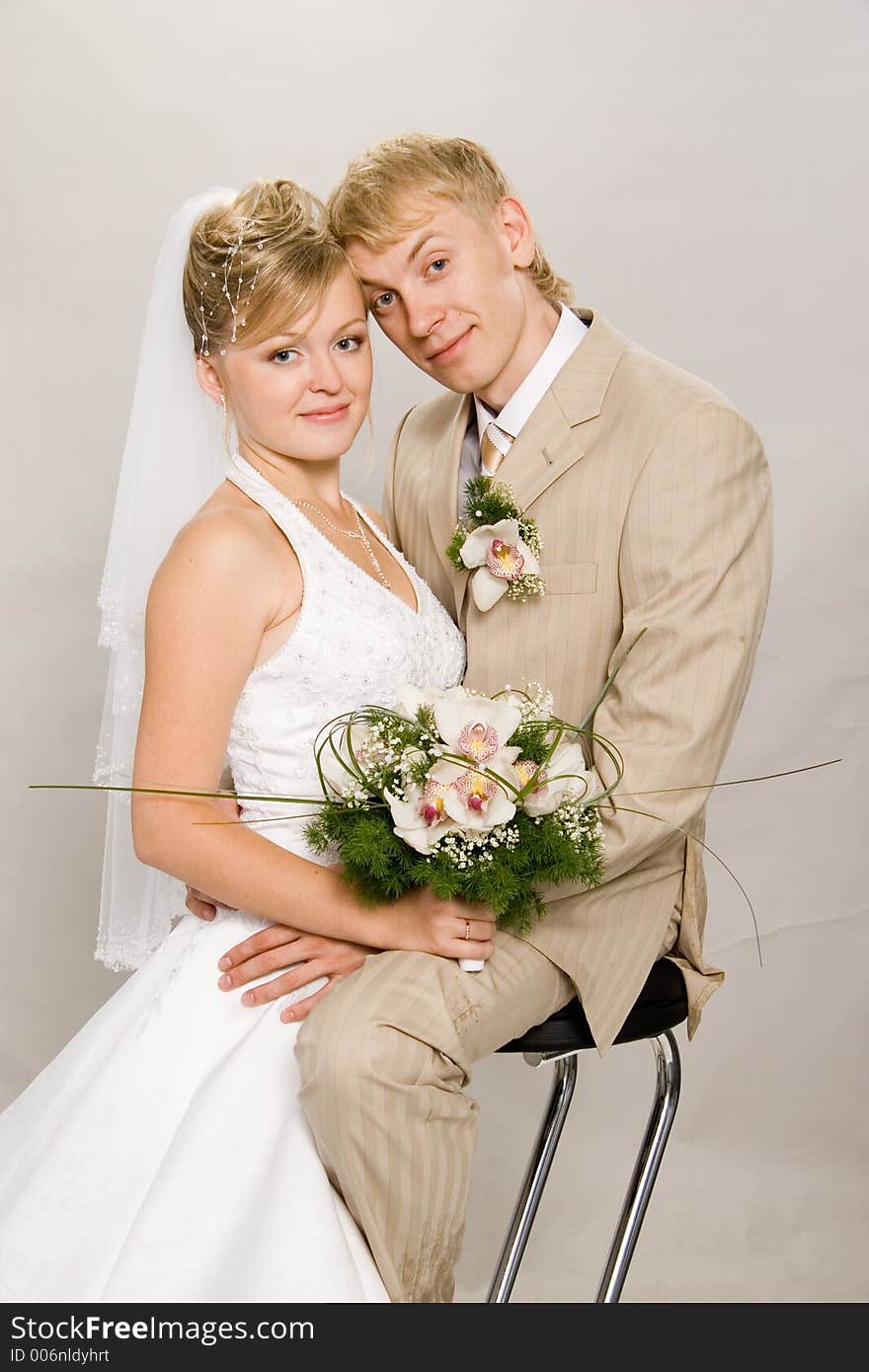 Portrait newlyweds in studio. Portrait newlyweds in studio