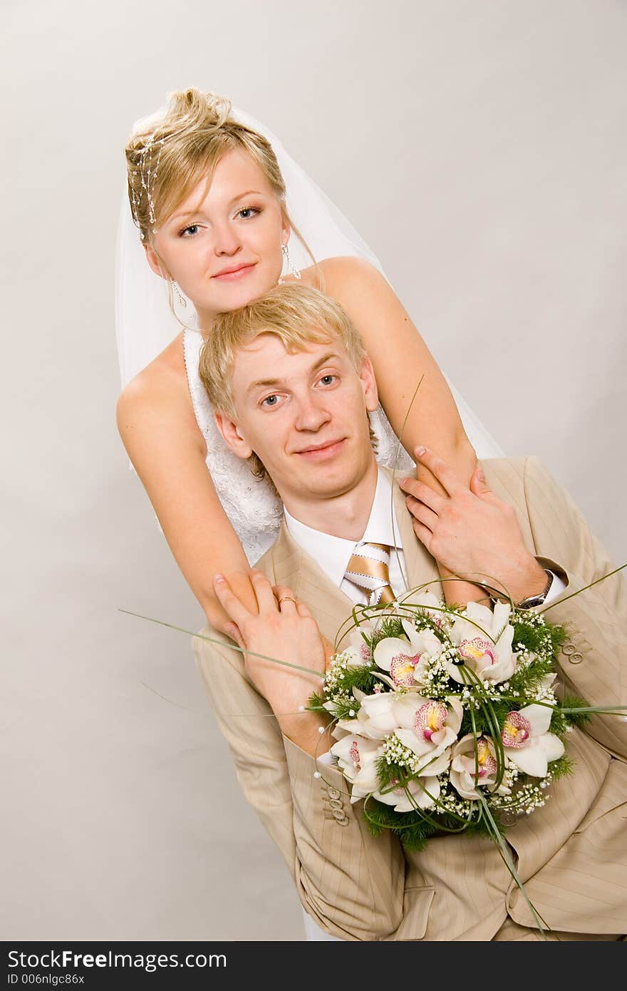 Portrait newlyweds in studio. Portrait newlyweds in studio