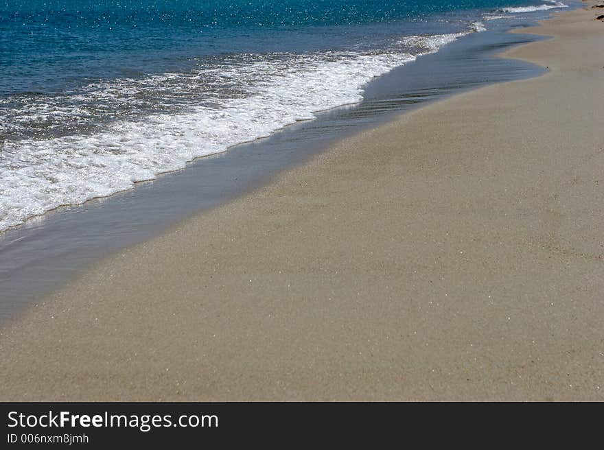 Coast of a beach, foam. Coast of a beach, foam