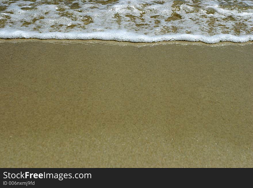 Coast of a beach, foam. Coast of a beach, foam