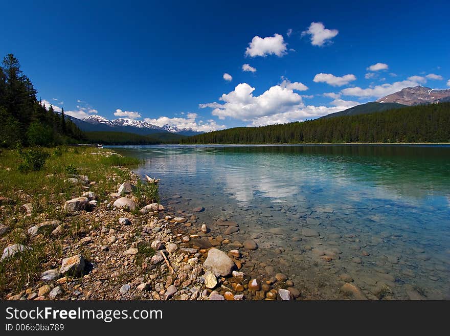 A beautiful mountain lake on a summer's day. A beautiful mountain lake on a summer's day.