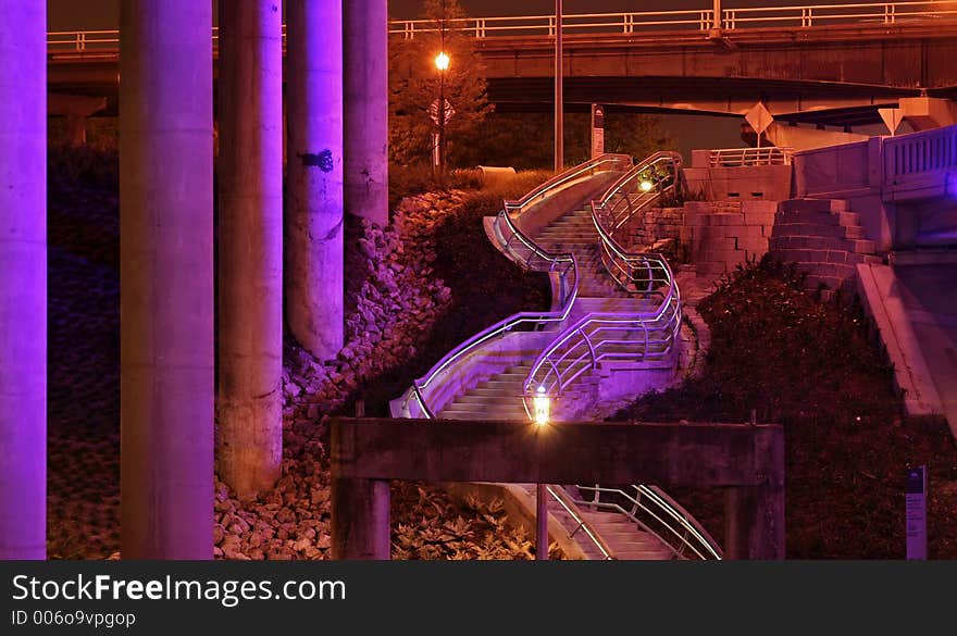 Stair to the bayou lit with purple light. Stair to the bayou lit with purple light