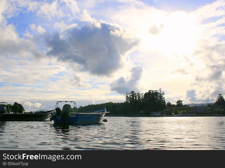 A boat by the sunset. A boat by the sunset.