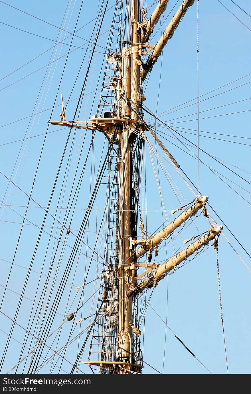 Sailboat's Main Mast with folded sails