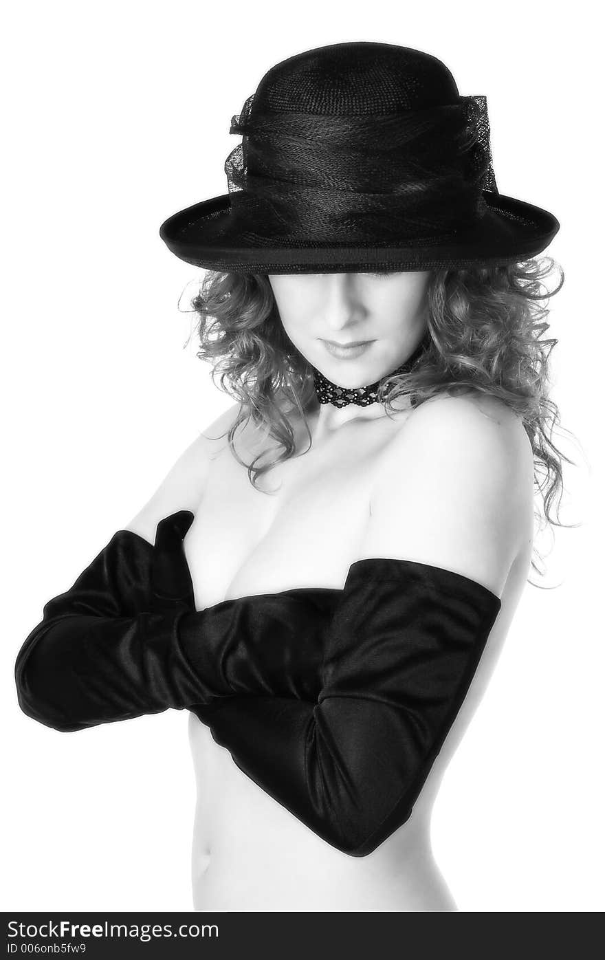 Lady in hat and gloves isolated in white