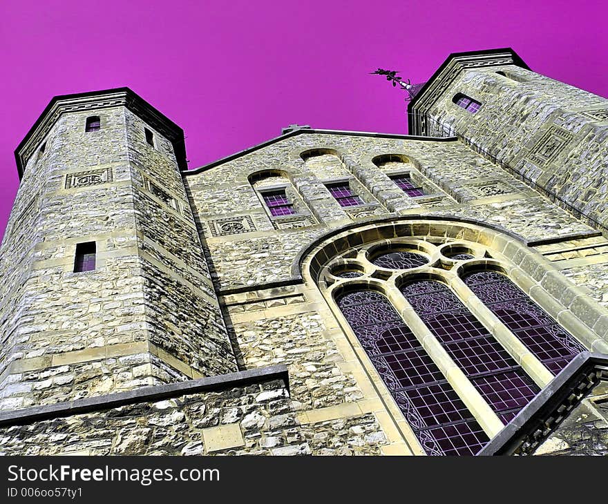 Church against catholic-purple background. Church against catholic-purple background