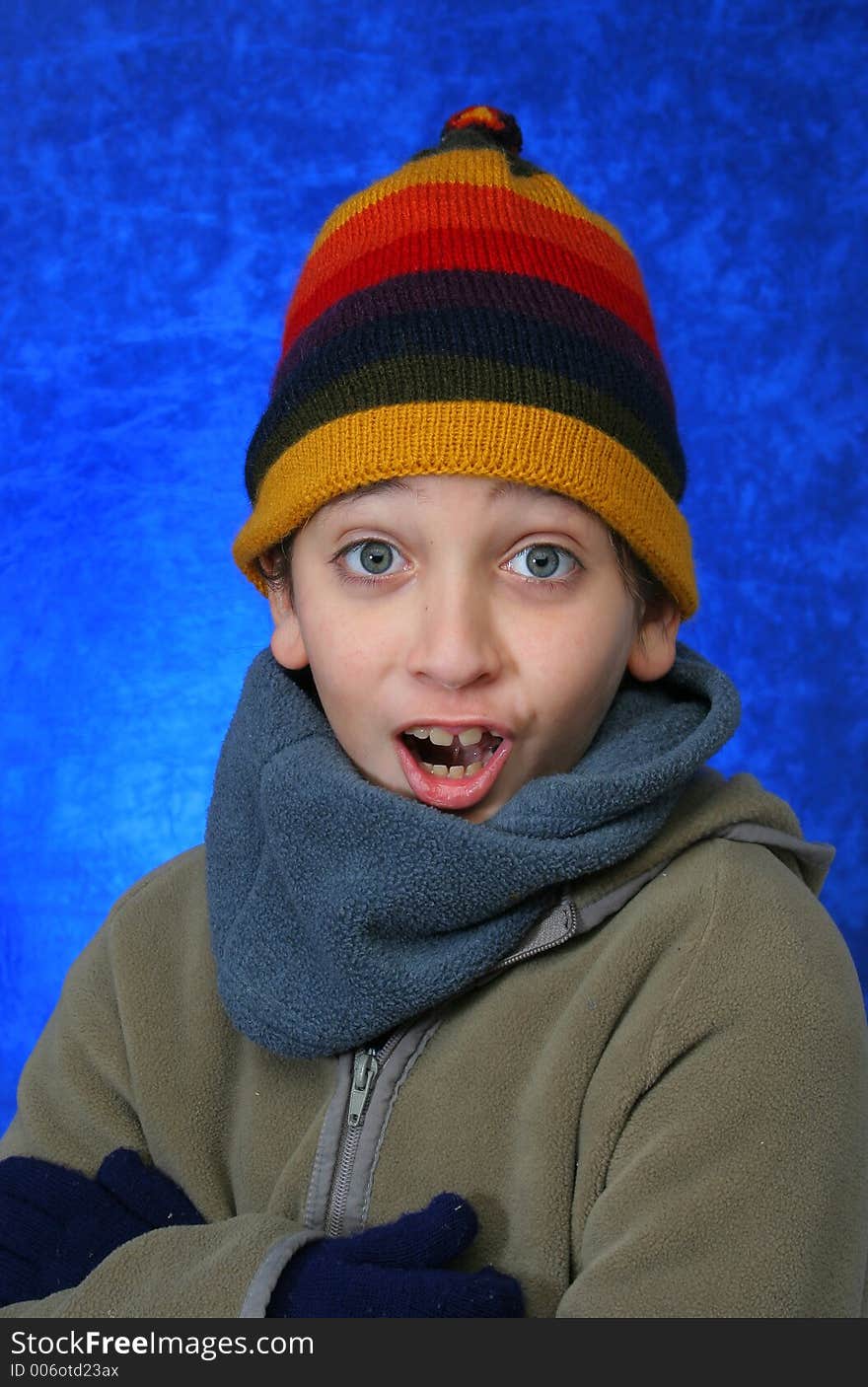 Boy doing fun expression in winter outfit. Look at my gallery for more winter images