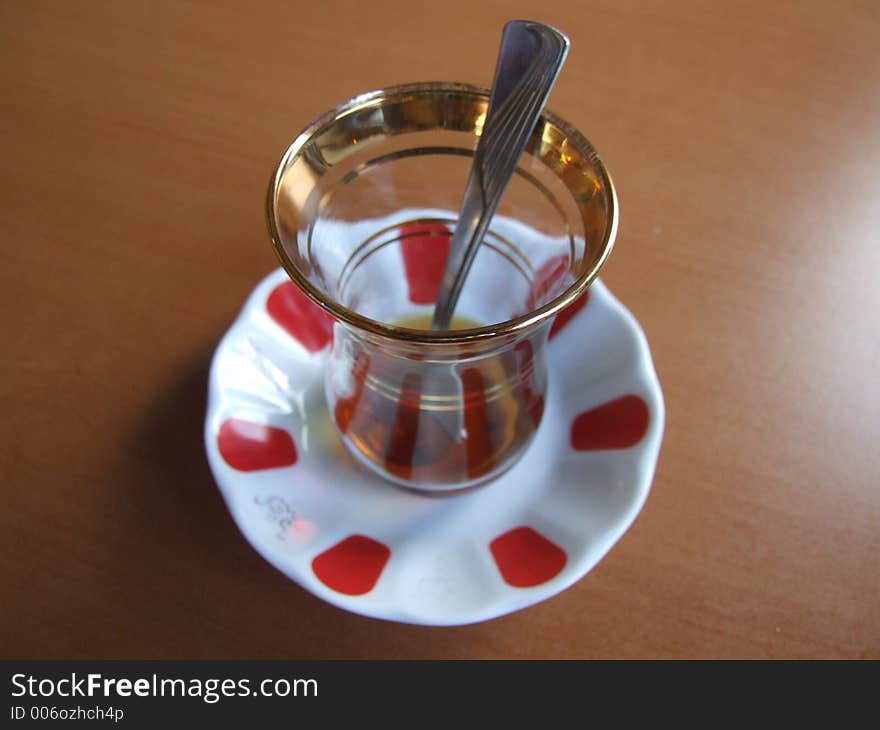 A glass of tea served with Turkish style