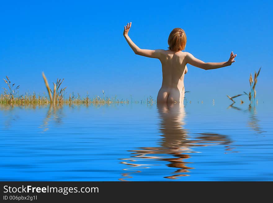 Naked girl in water