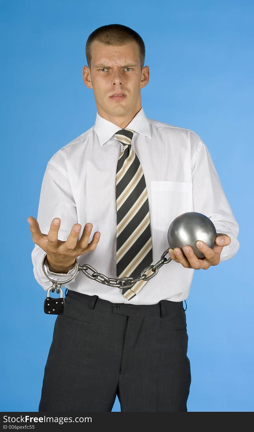 Businessman with ball and chain. Businessman with ball and chain