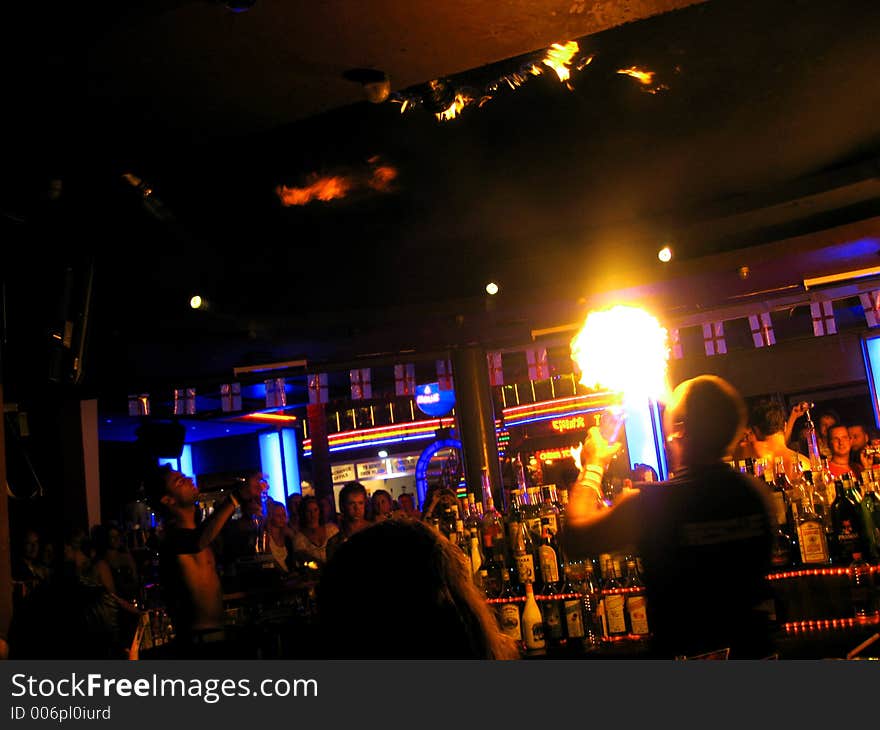 Barmen breathing fire at a nightclub in Zante, Greece. Barmen breathing fire at a nightclub in Zante, Greece.