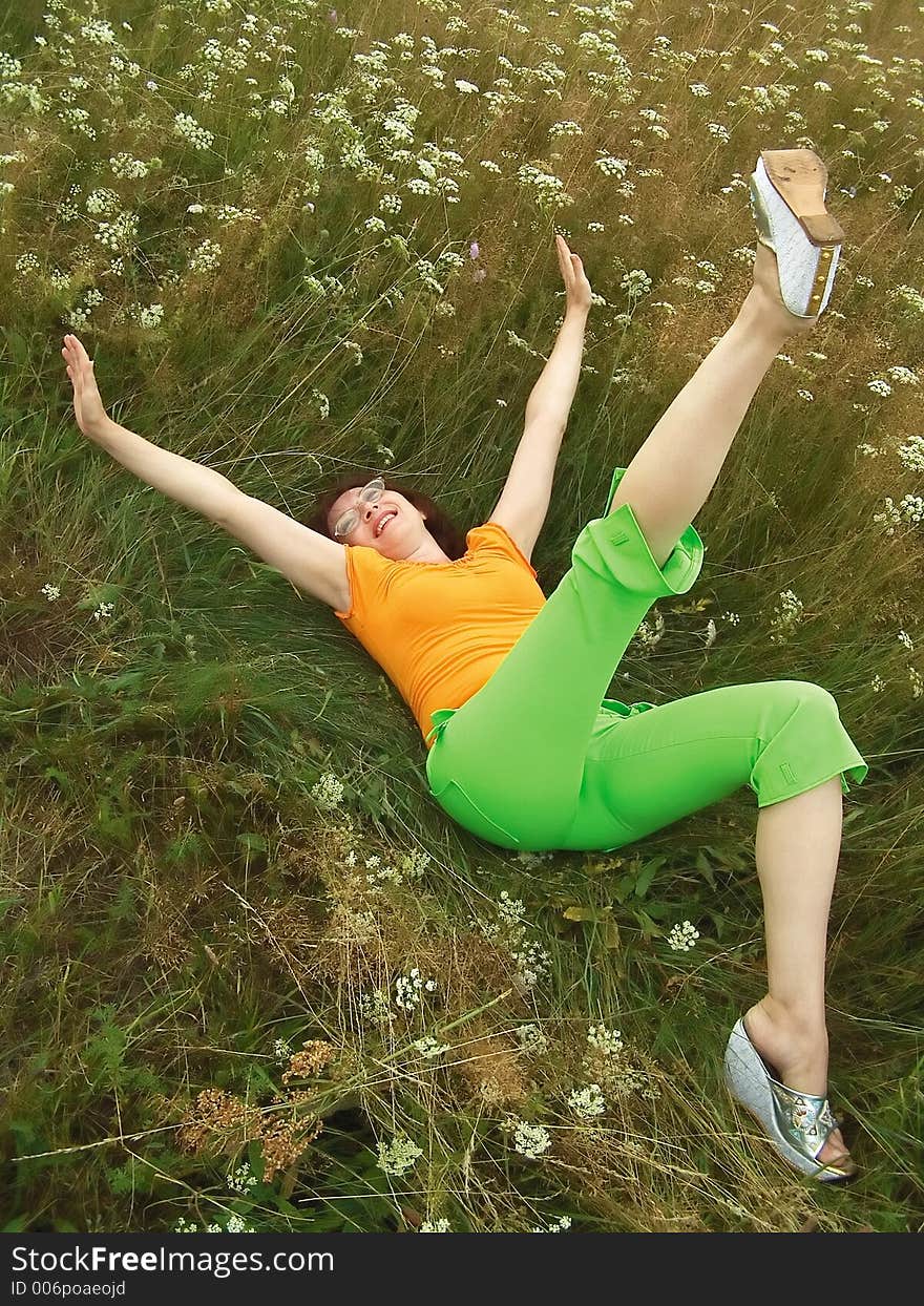 Girl reposes on grass. Girl reposes on grass