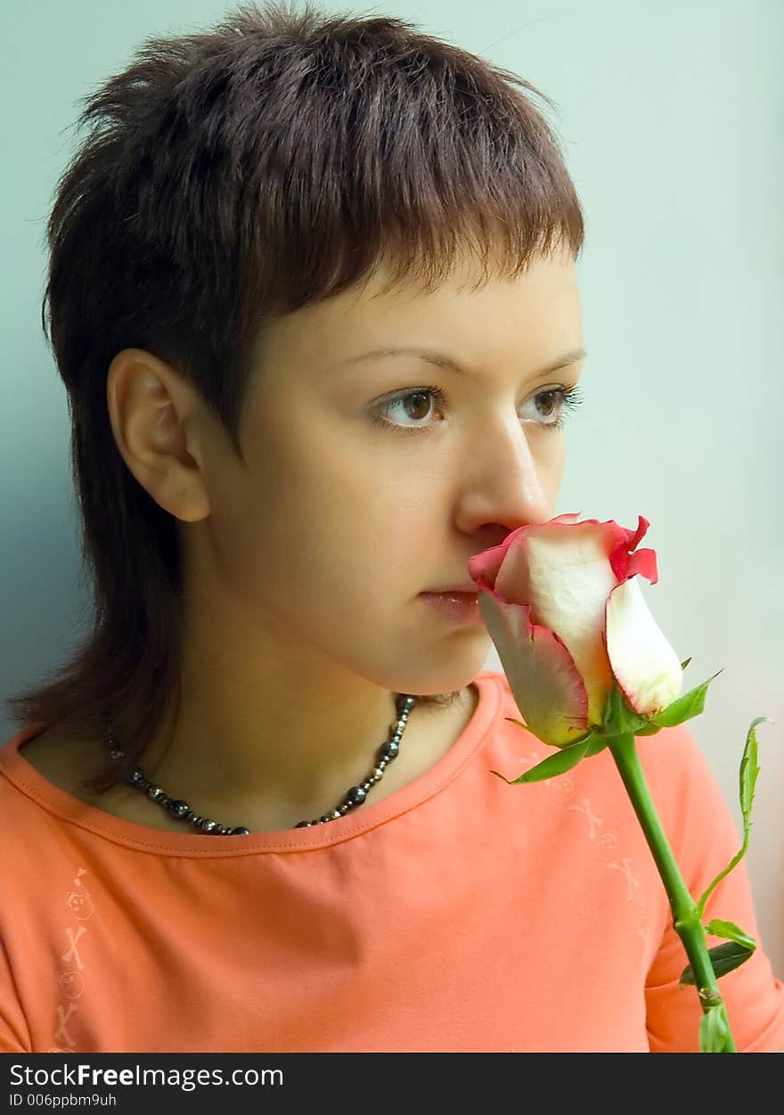 Pretty girl with rose