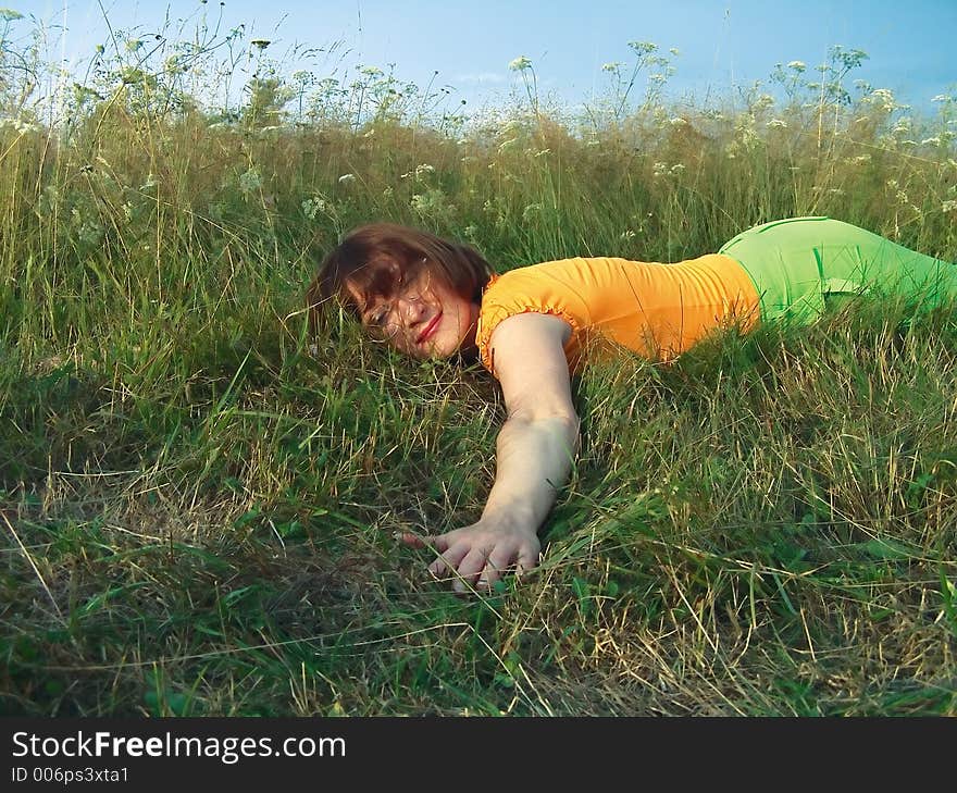 Girl reposes on grass. Girl reposes on grass