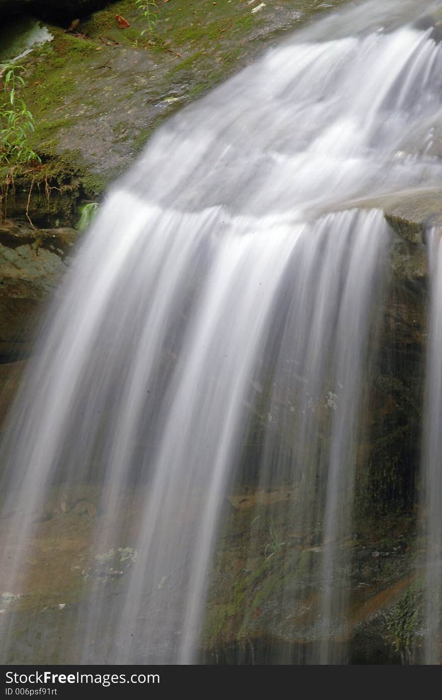 Partial image of a small waterfall.